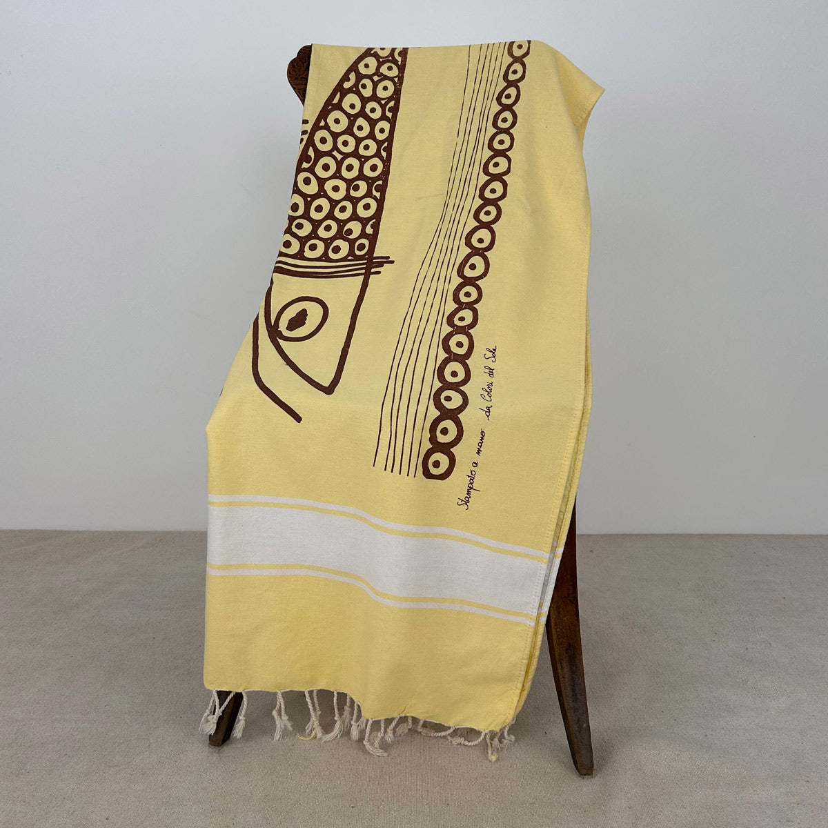 Telo mare Futà Greco su fondo giallo