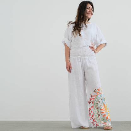 Wide pants with a gathered waist.