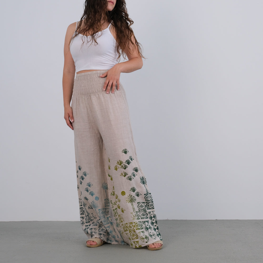 Wide pants with a gathered waist.