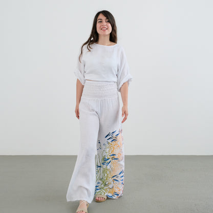 Wide pants with a gathered waist.