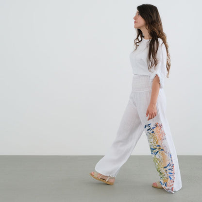 Wide pants with a gathered waist.