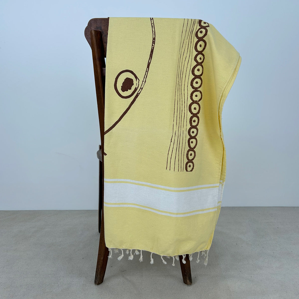 Telo mare Futà Greco su fondo giallo